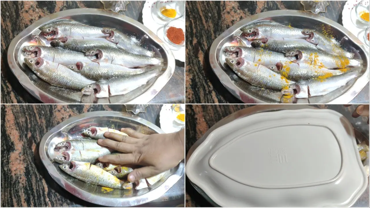 Marinating bata fish with salt and turmeric powder