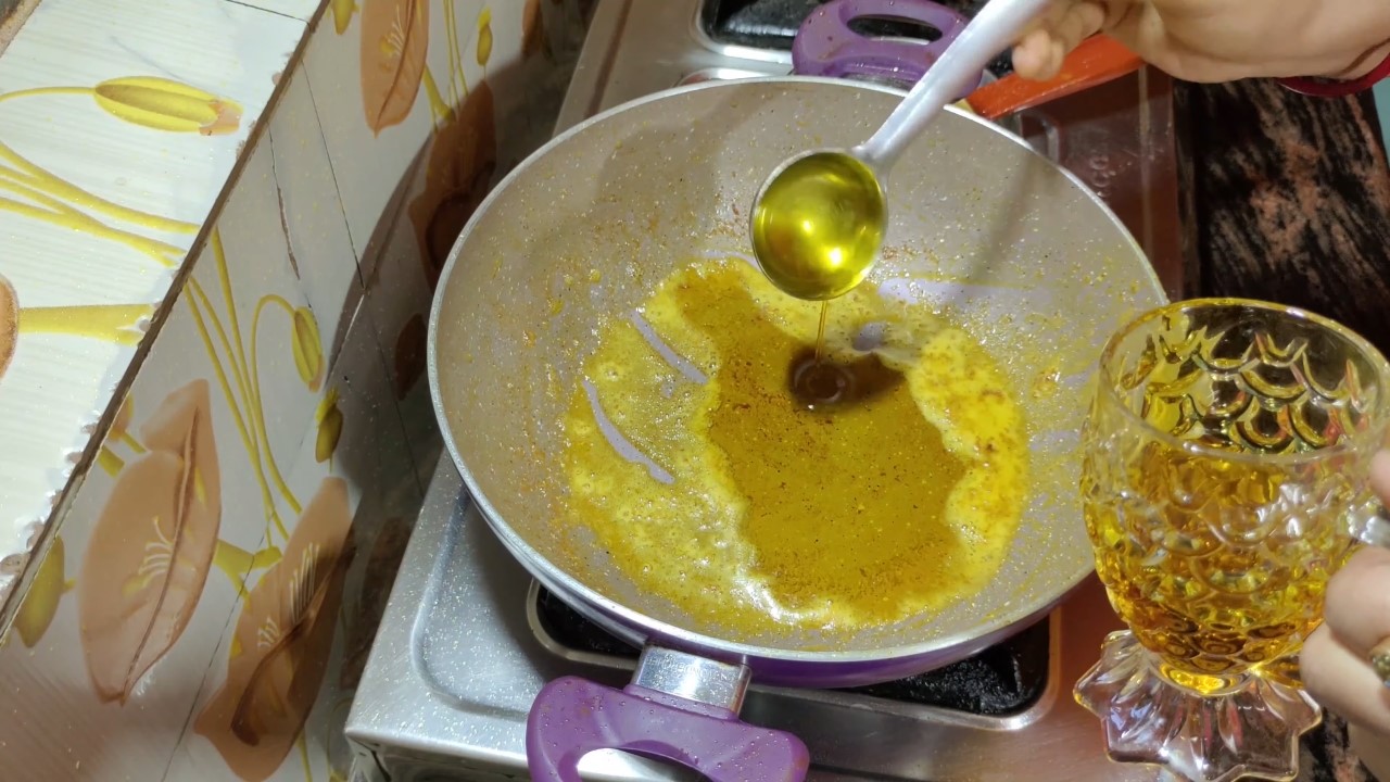 Adding oil into the pan