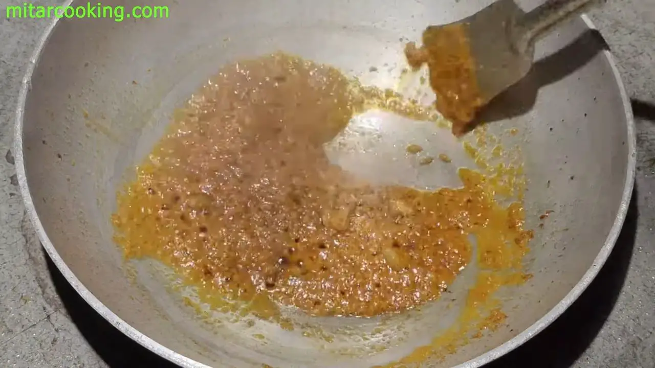 Adding onion-ginger-garlic paste