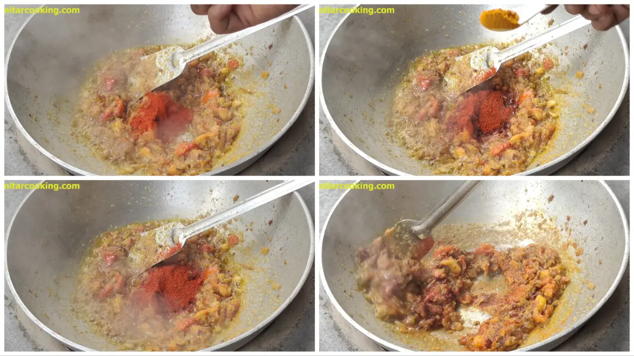 Adding a little bit of water and powdered spices such as turmeric, red chili, Kashmiri red chili