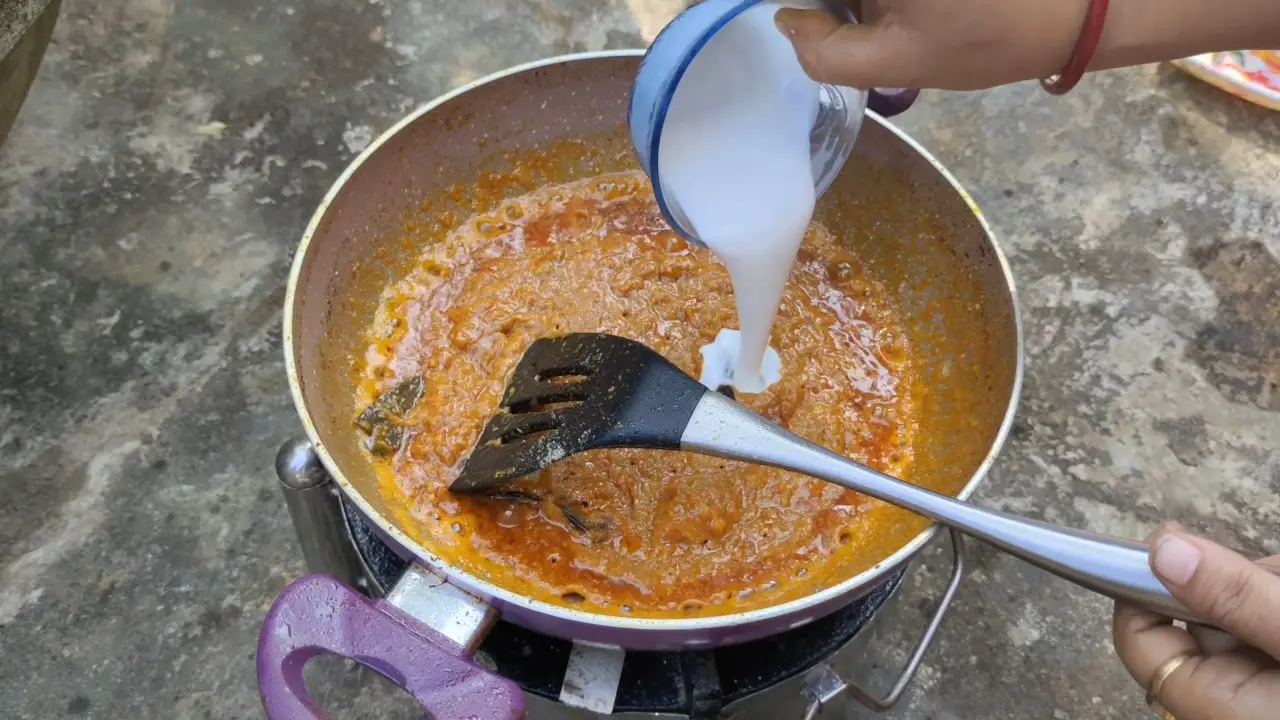 Adding whisked yogurt