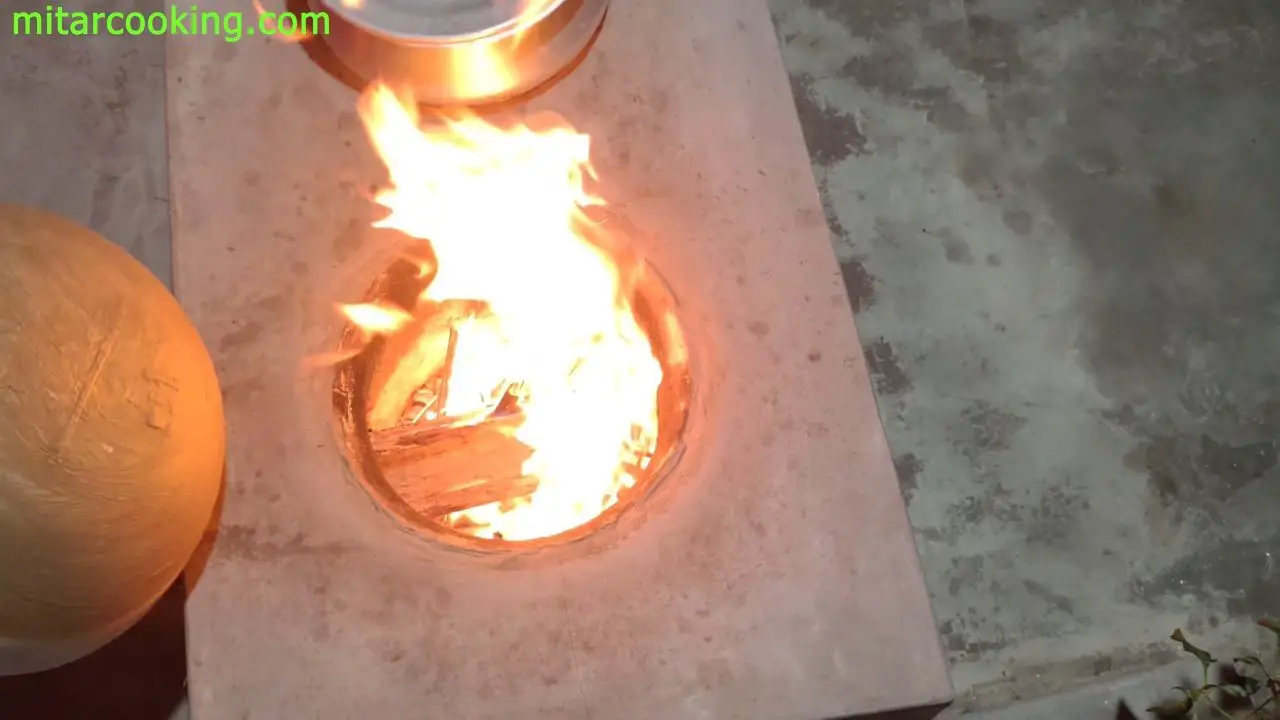 Firing up clay stove