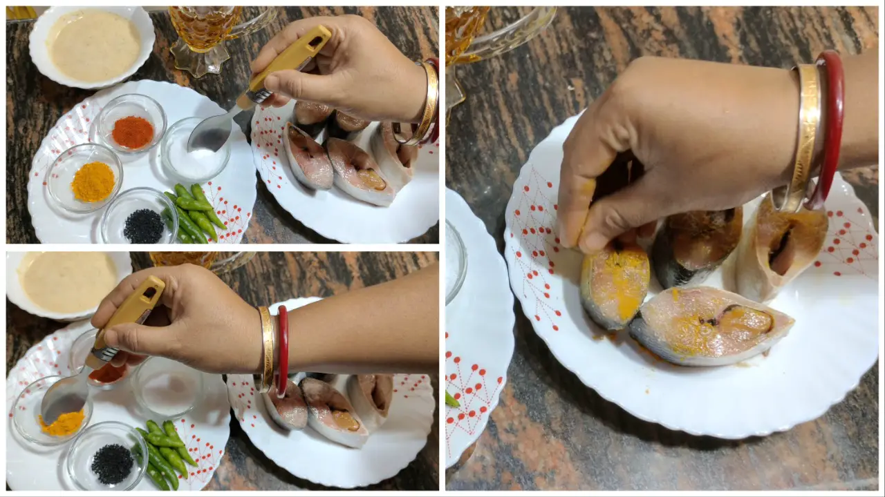 Marinating the Hilsa fish pieces with salt and turmeric powder