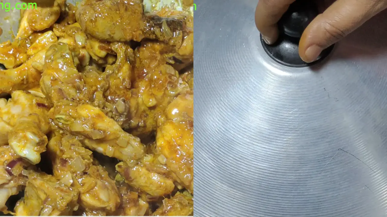 Mixing the spices with the chicken