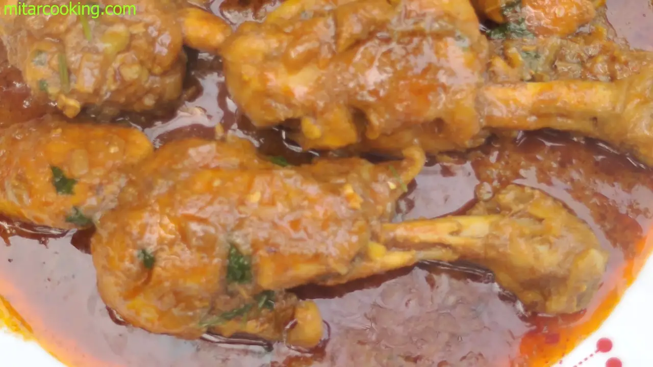 Pouring Chicken Masala Gravy into a bowl
