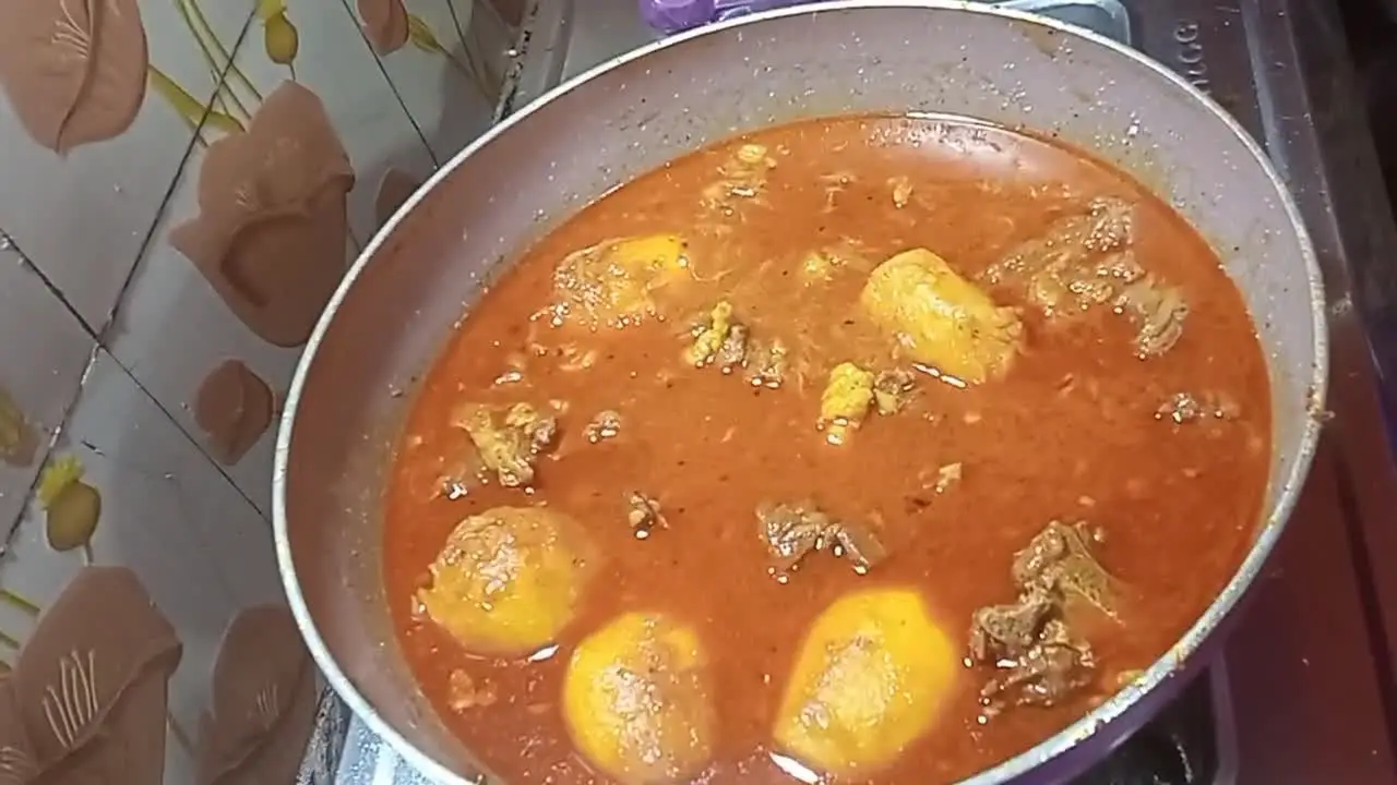 Retransferring the Button Dak Bungalow to the cooking pan