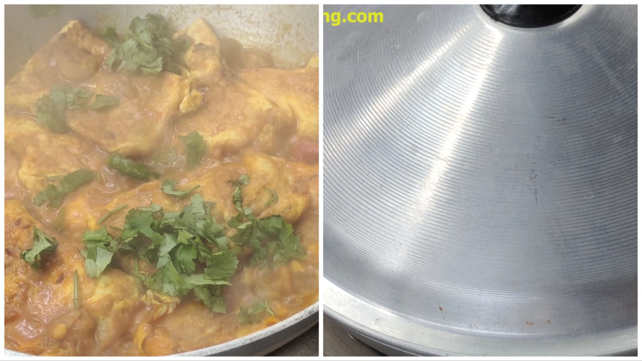 Sprinkling coriander leaves on fried egg curry