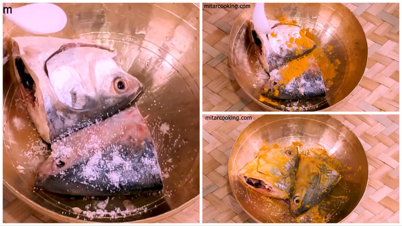 Marinating the Hilsa fish heads with a pinch of salt and turmeric