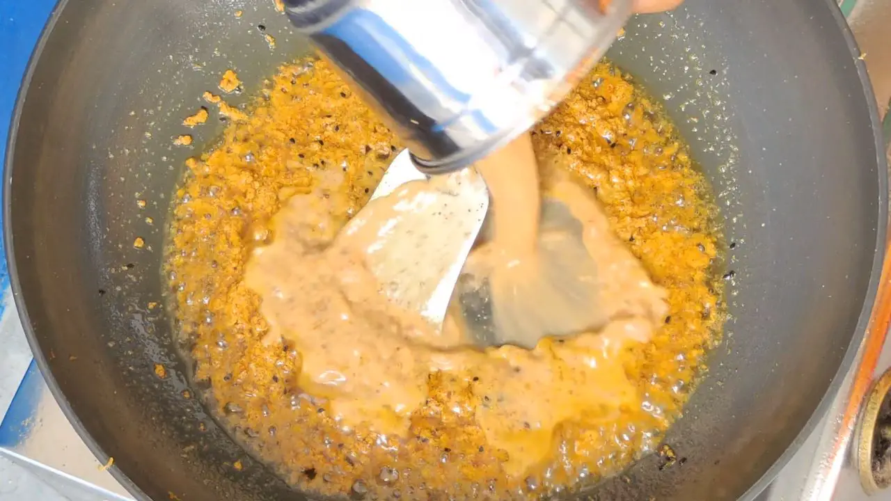 Clean the bowl and add the spice-loaded water to the pan