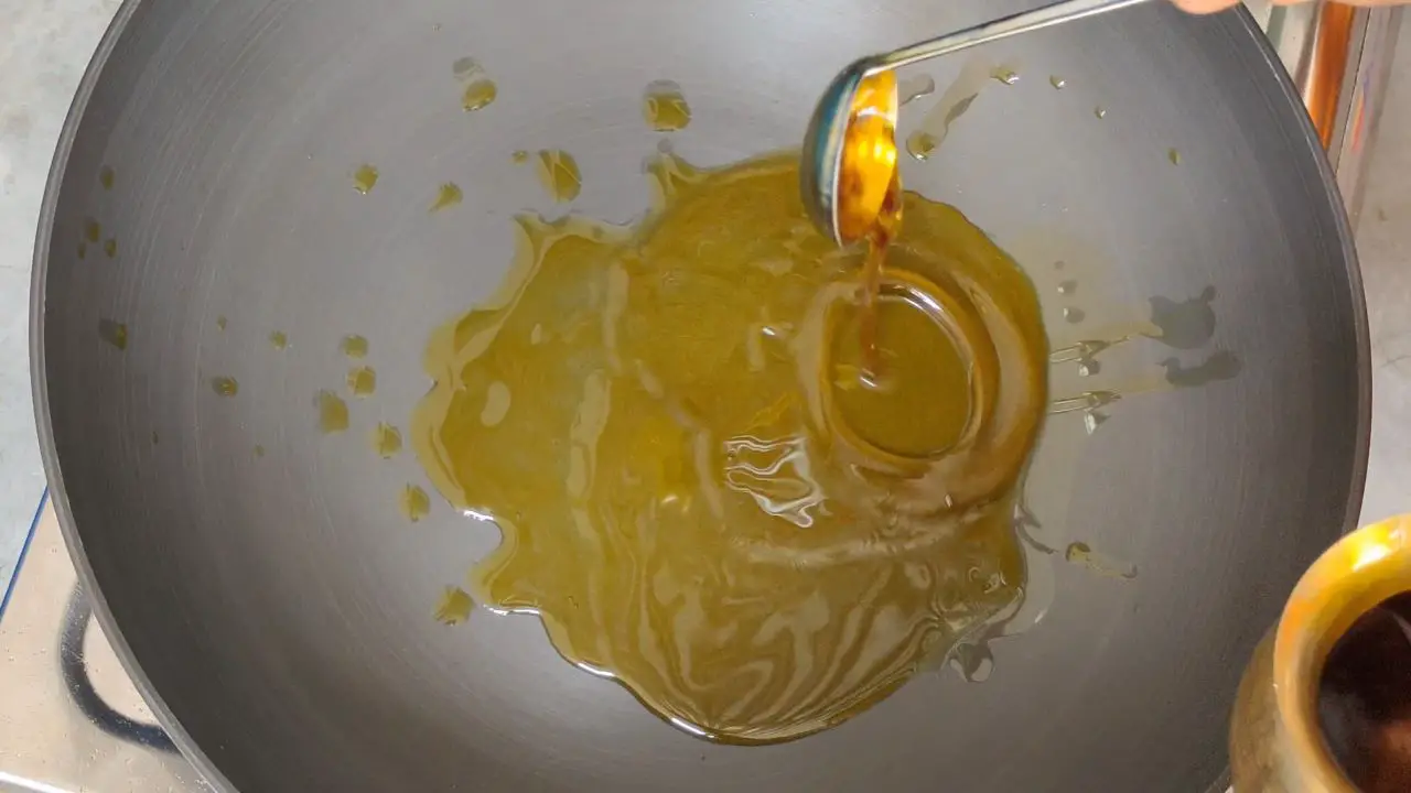 Heat oil in a pan.