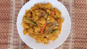 Ilish Macher Matha Diye Chal Kumro