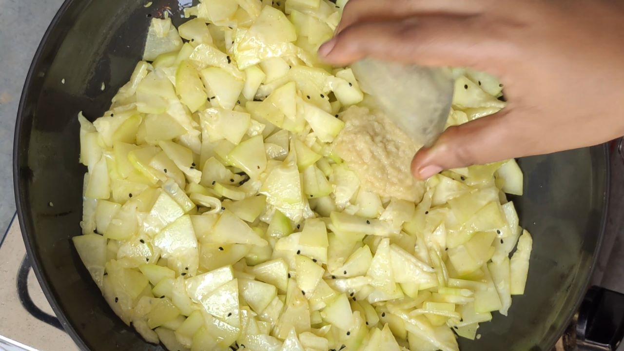 Add garlic ginger paste in ash gourd