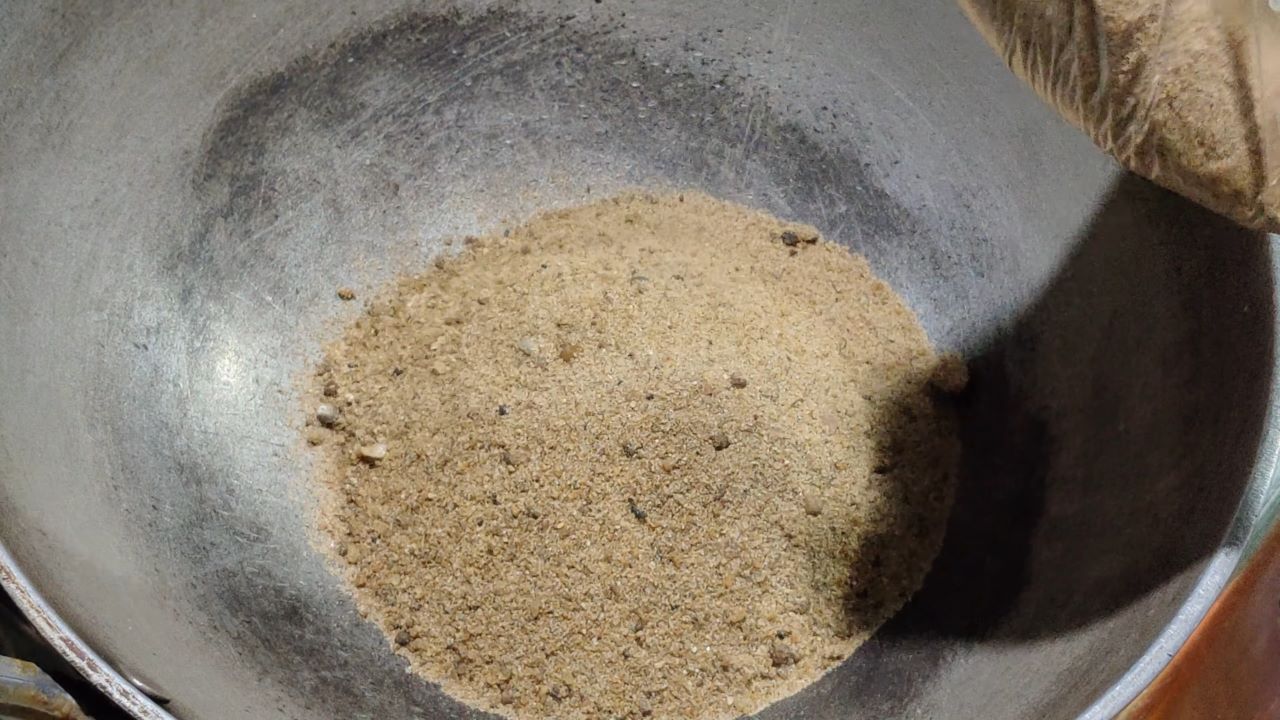 Pour sand in a pan