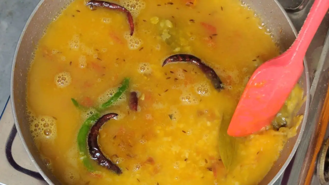 pour the boiled matar dal into the kadai