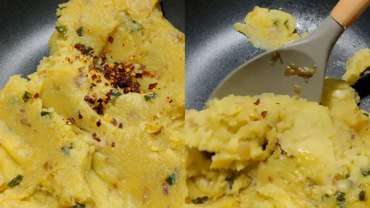 Adding the smashed red chilies to the boiled potato mixture