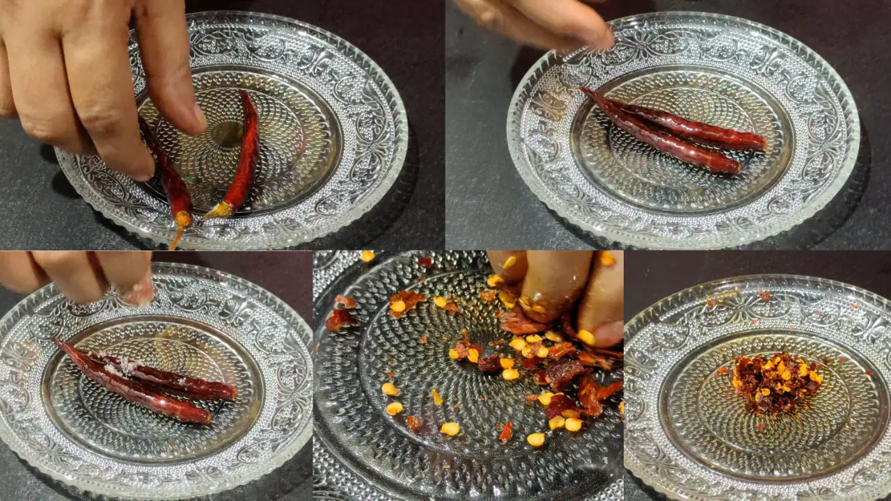 Smashing fried red chillies with salt
