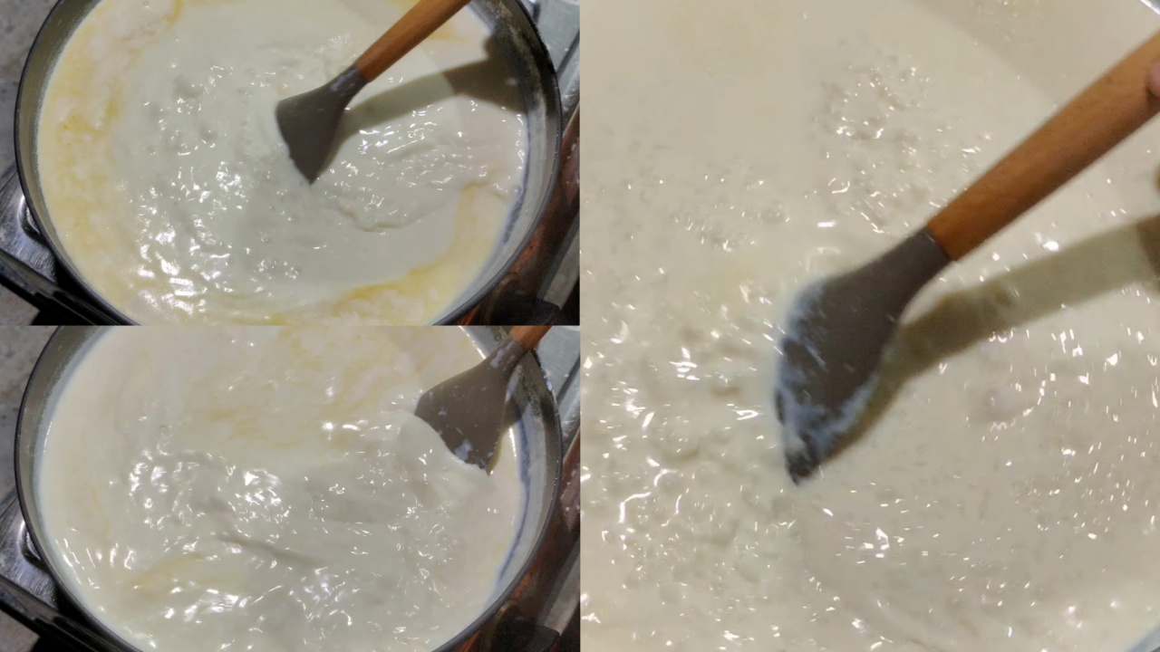 Stirring it frequently to prevent it from sticking to the bottom of the wok