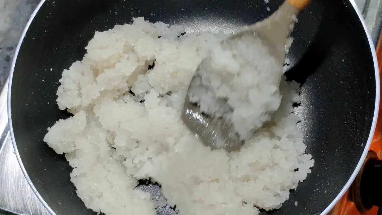 Stirring coconut mixture