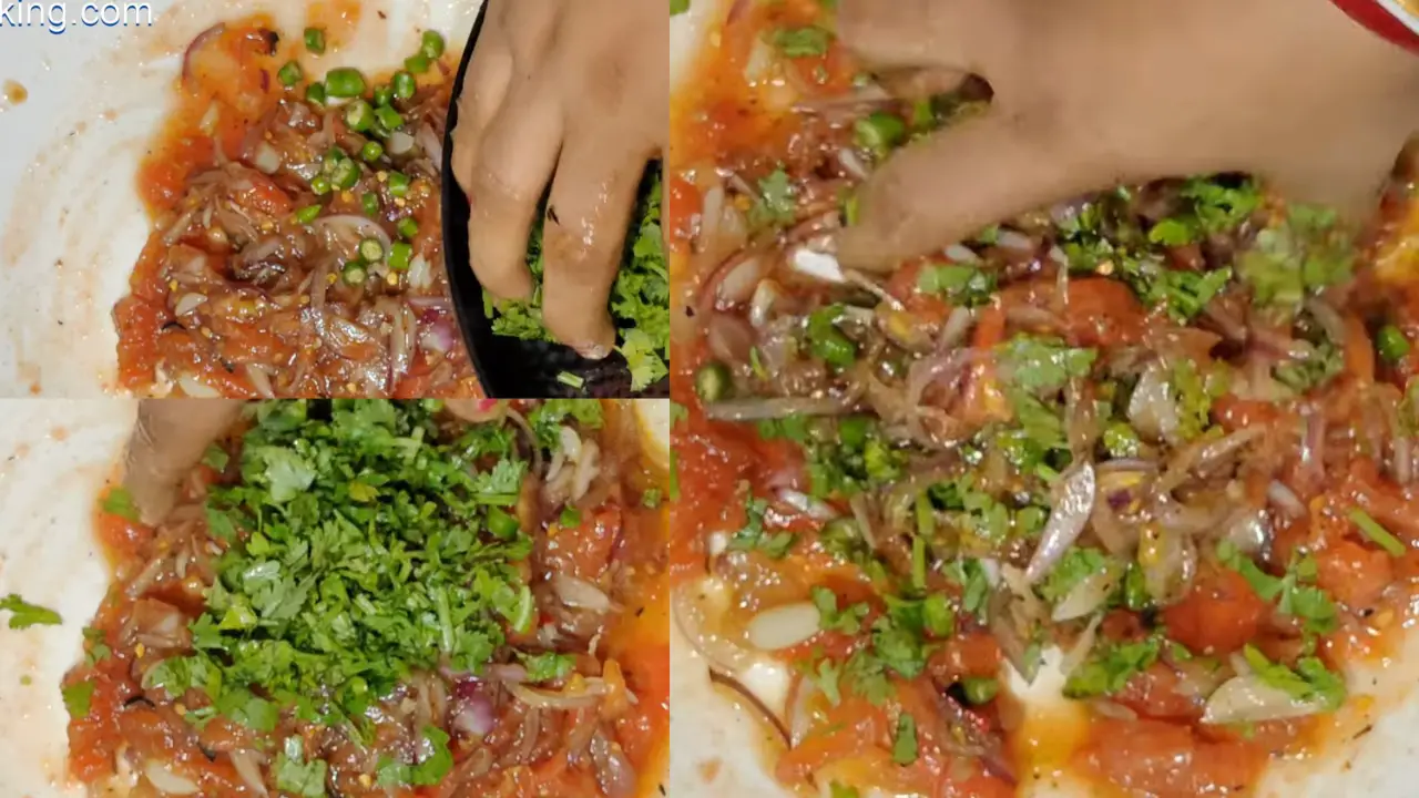 Adding the chopped green chilis and coriander leaves