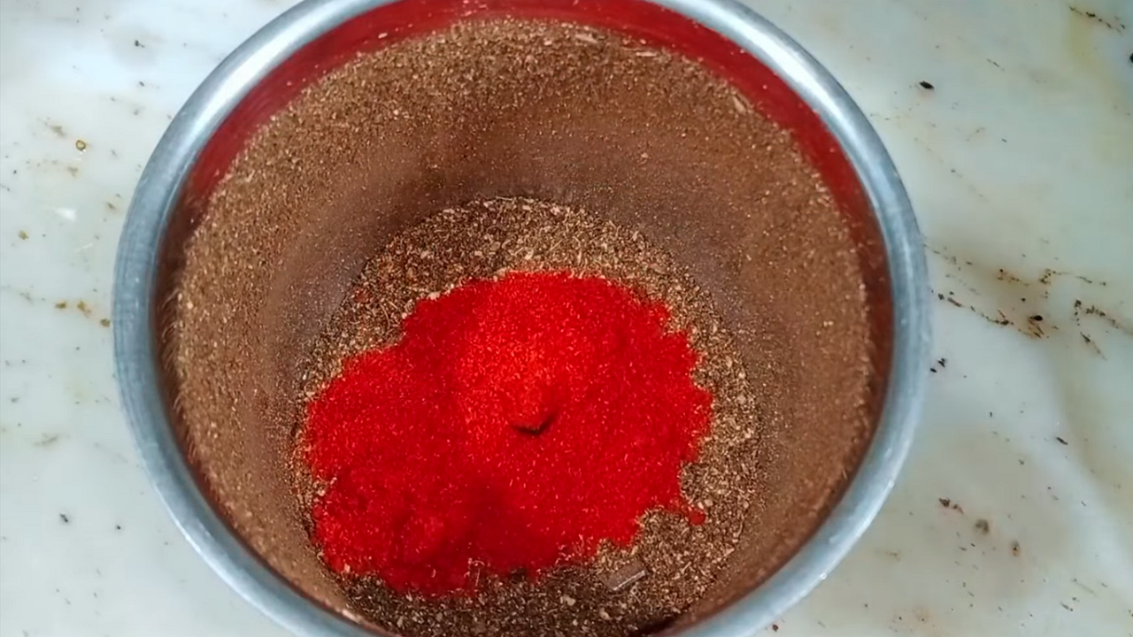Adding 2 tbsp of Kashmiri red chili powder