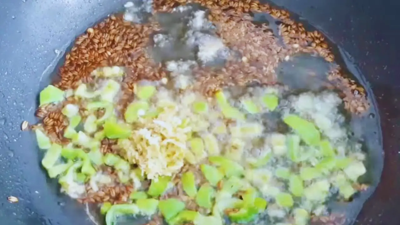 Adding 1 tsp of ginger-garlic paste to the content