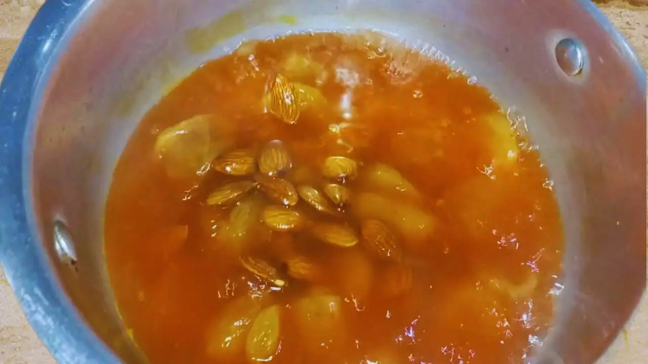 Adding 10 pieces of soaked almonds