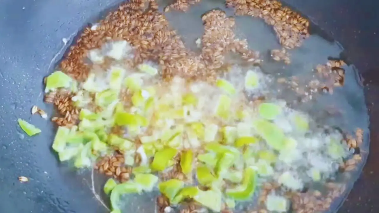 Adding 2 finely chopped green chilies