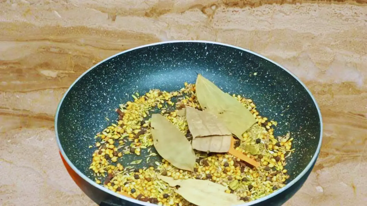 Adding 4 medium pieces of bay leaves