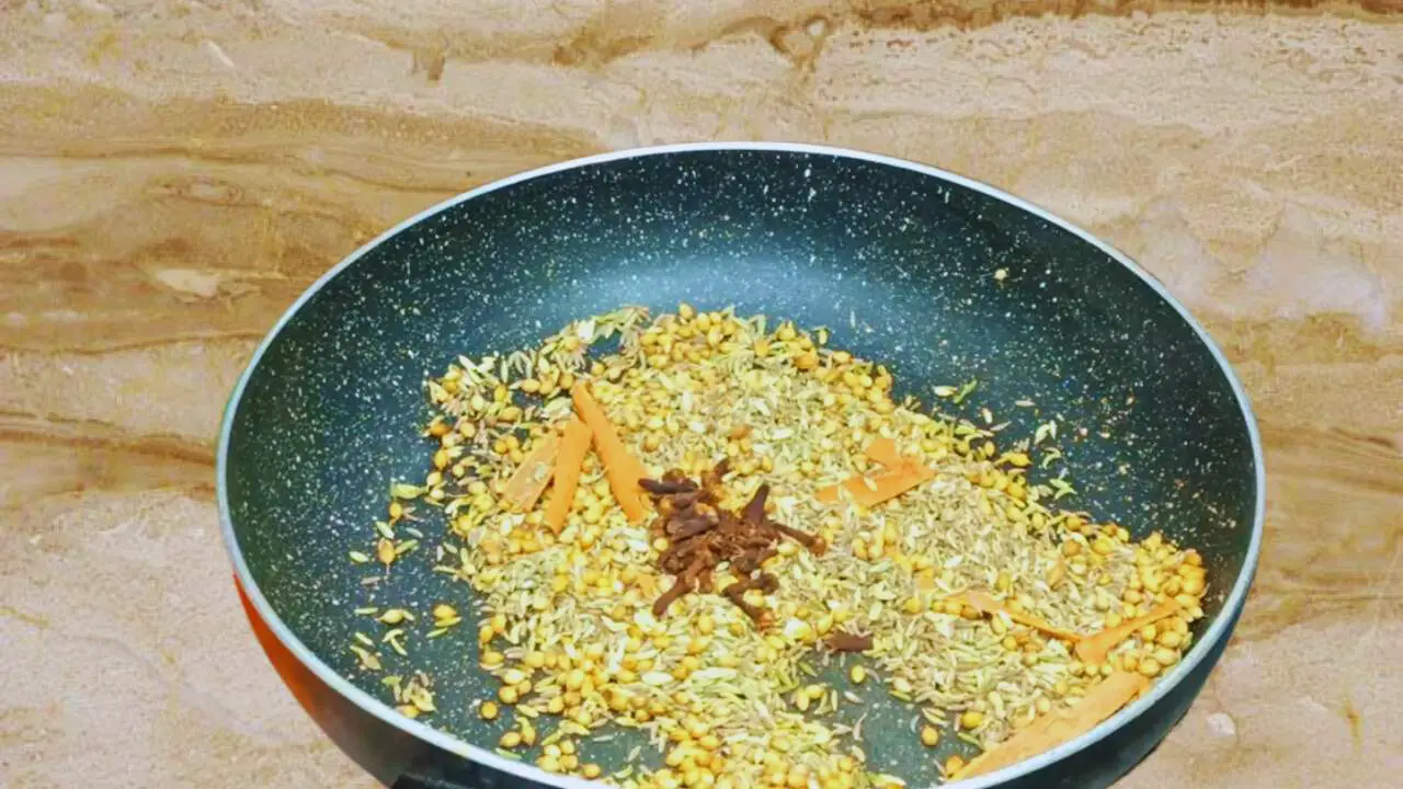 Adding about 15 pieces of cloves
