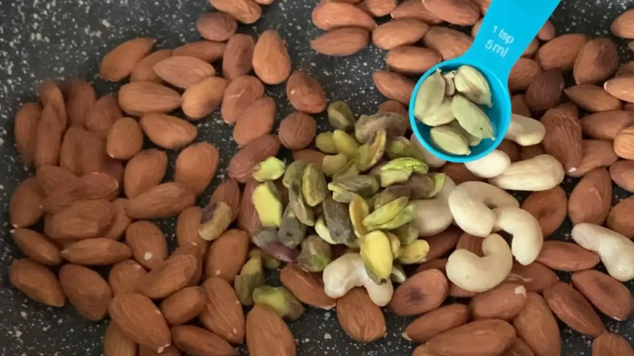 Adding 1 tsp green cardamom pods