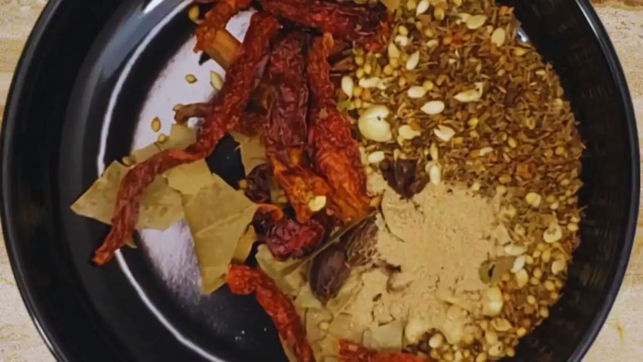 Adding 1 tsp of dry mango powder (amchur)