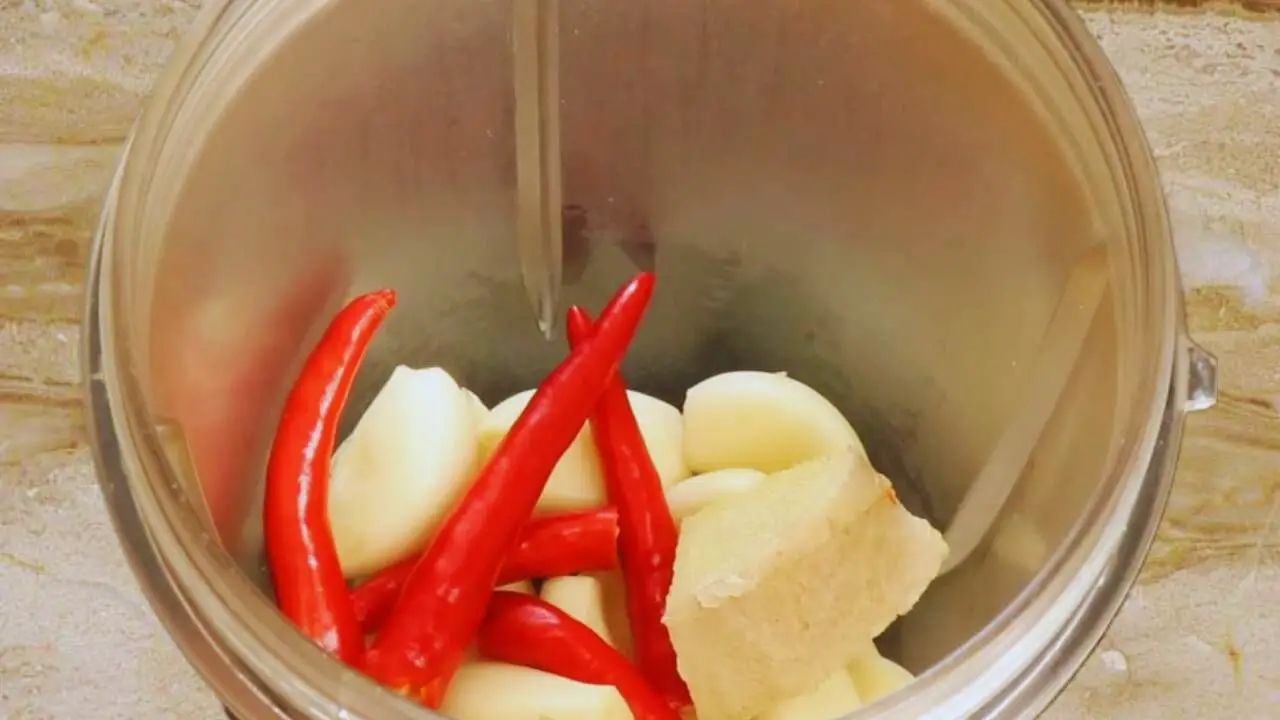 Adding 1 piece of fresh and deskinned ginger of about 1-inch size