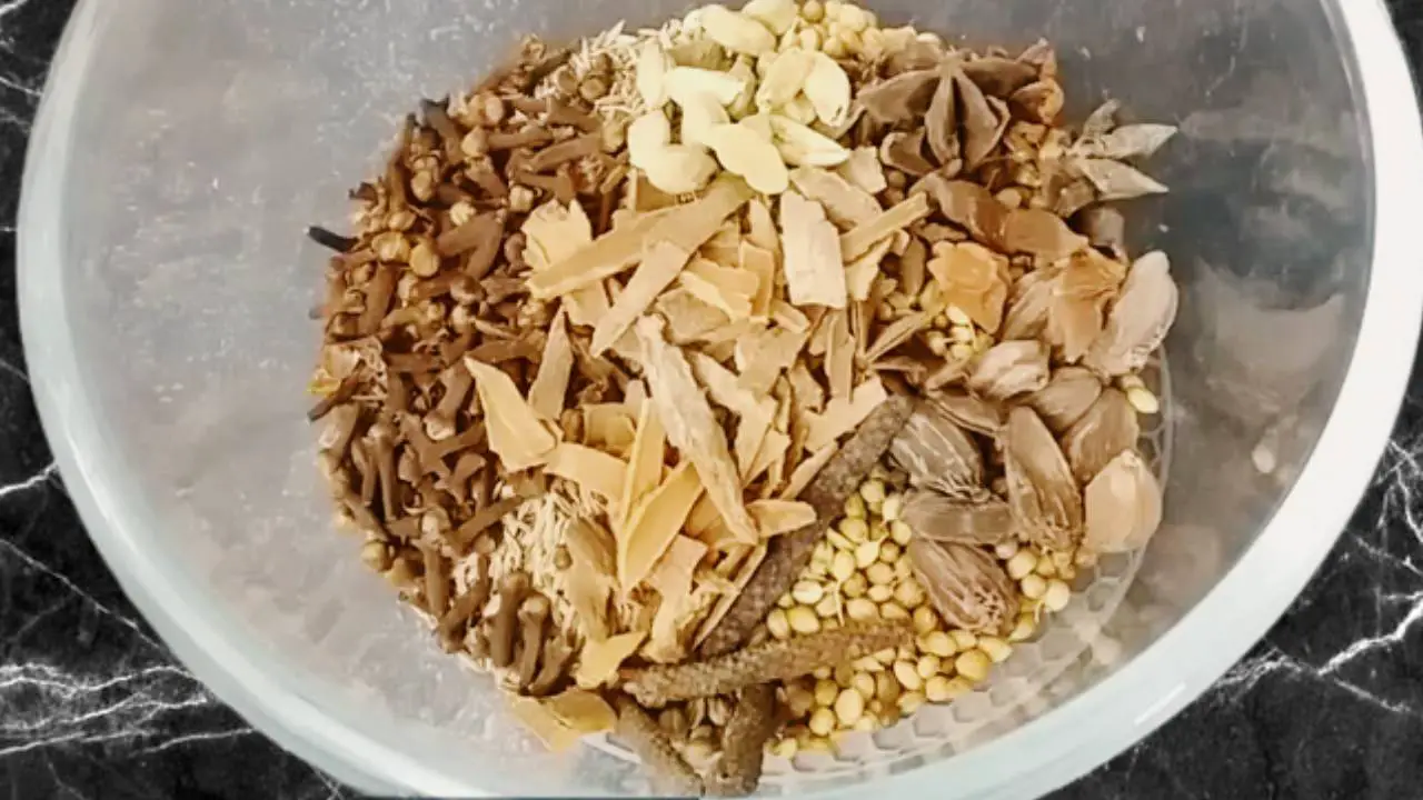 Adding 15 pieces of green cardamom