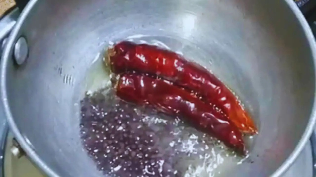 Adding 1 tsp of mustard seeds