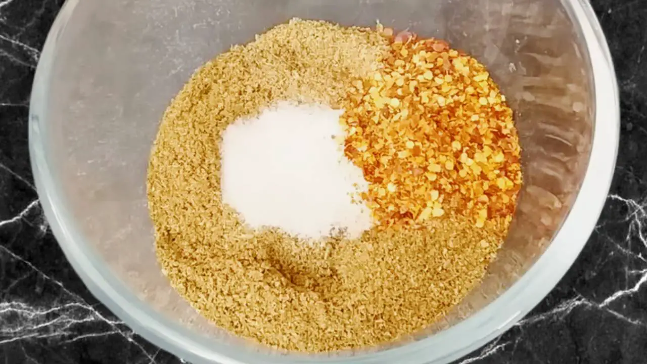 Adding 1 tbsp of red chili flakes