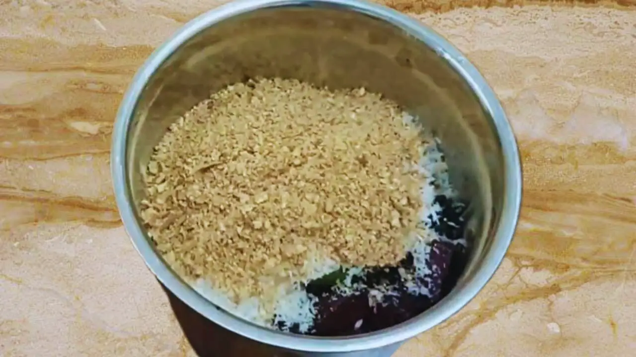 Adding the spices that you ground before