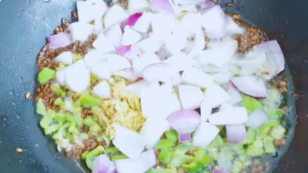 Adding two medium pieces of onions