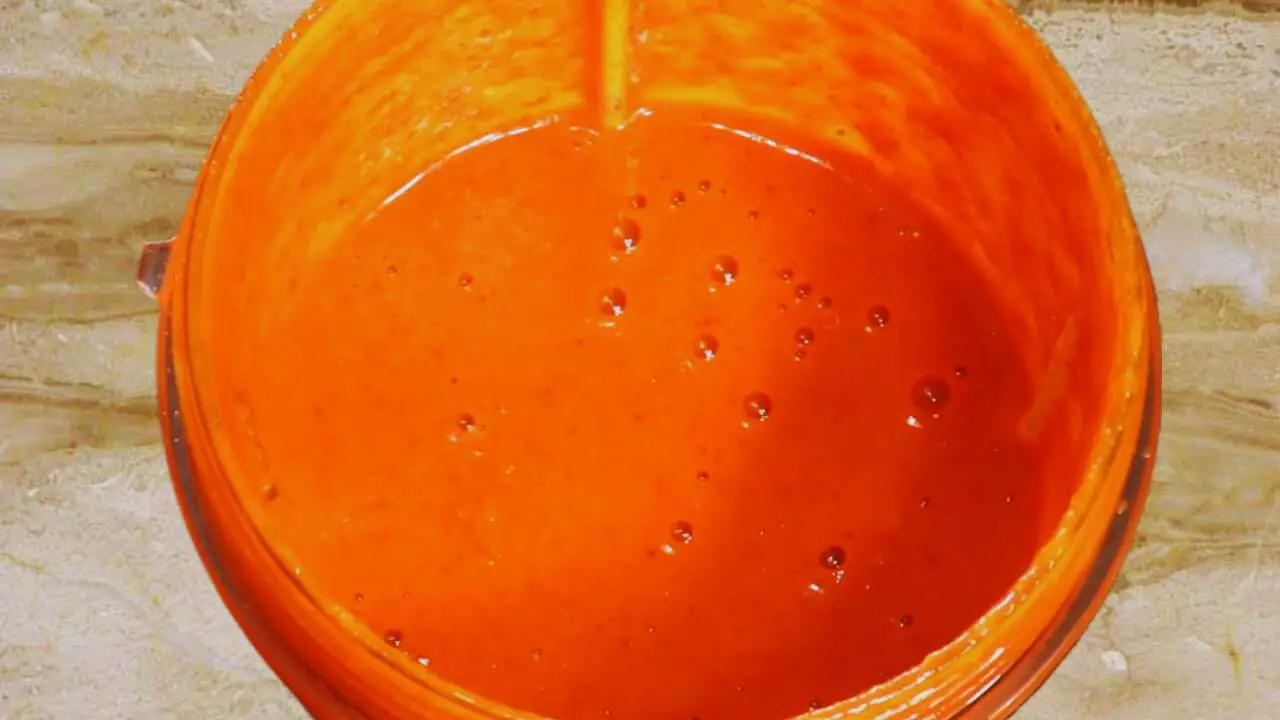 Blending the ingredients nicely to get a fine paste