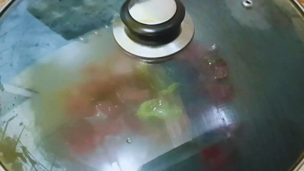 Covering the pan and cook the ingredients on a low flame