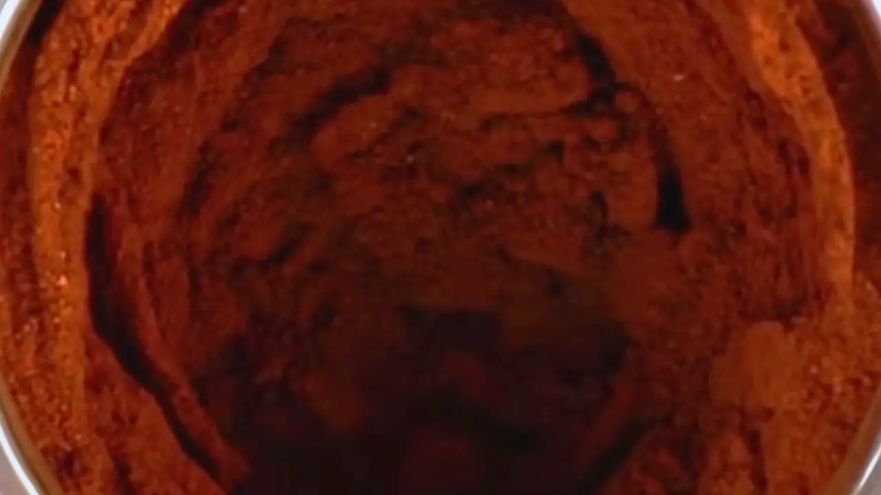 Grinding the spices nicely into a fine powder
