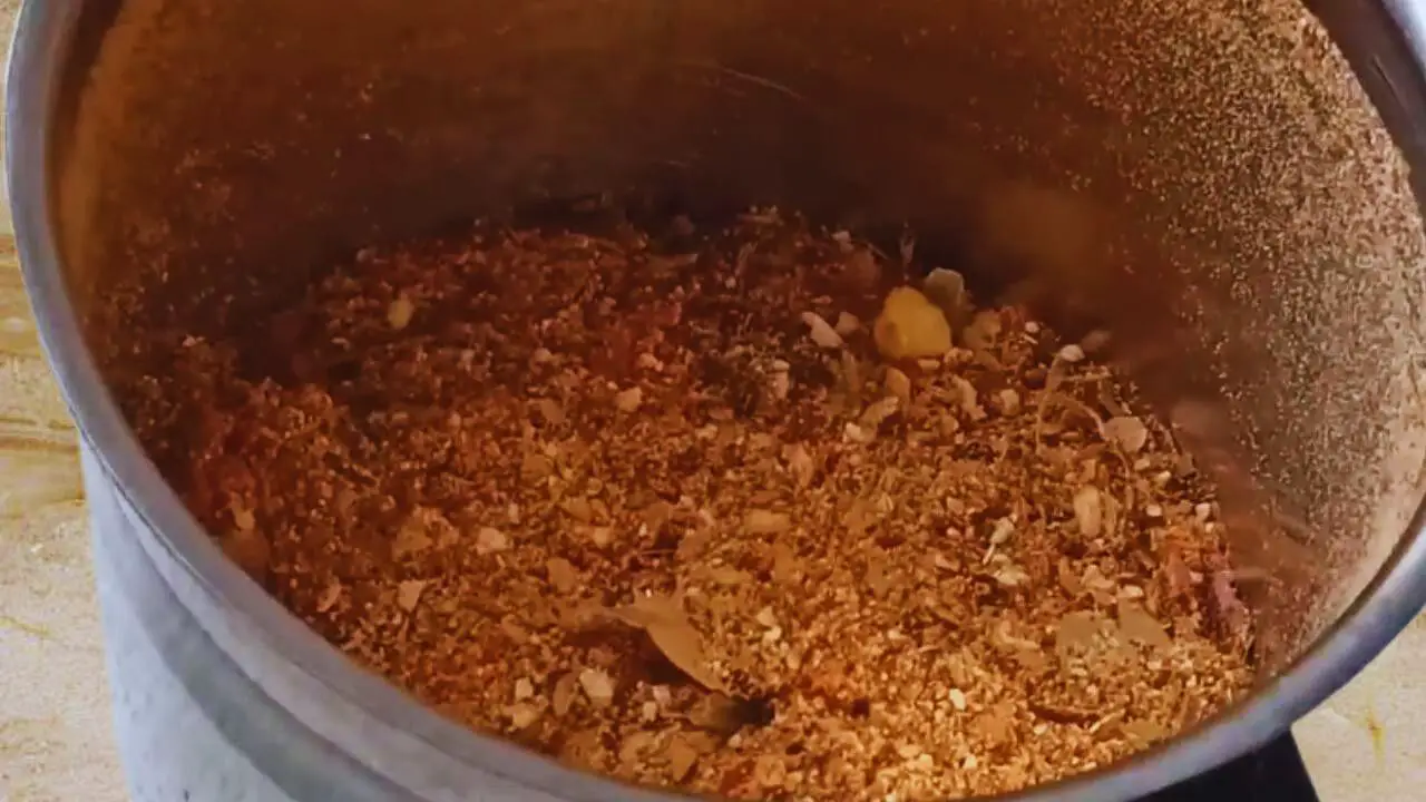 Grinding the spices into a powder