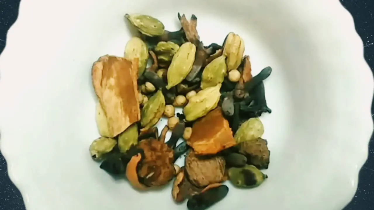 Transferring the spices to a bowl