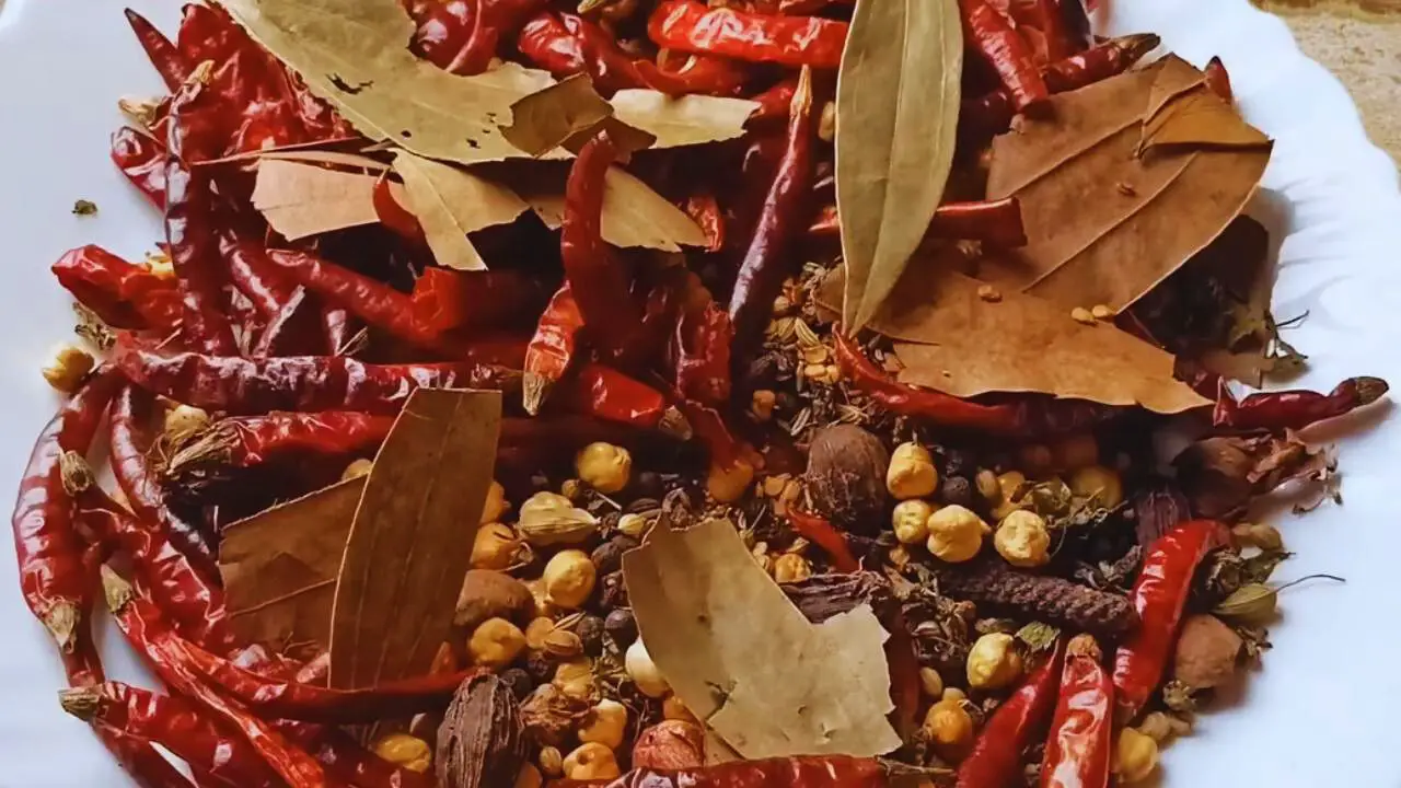 Transferring the roasted spices onto a plate