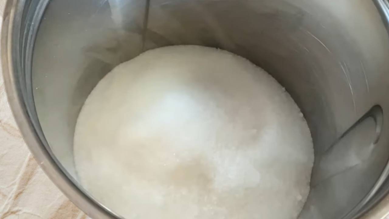 Pouring 1.5 cups of normal sugar