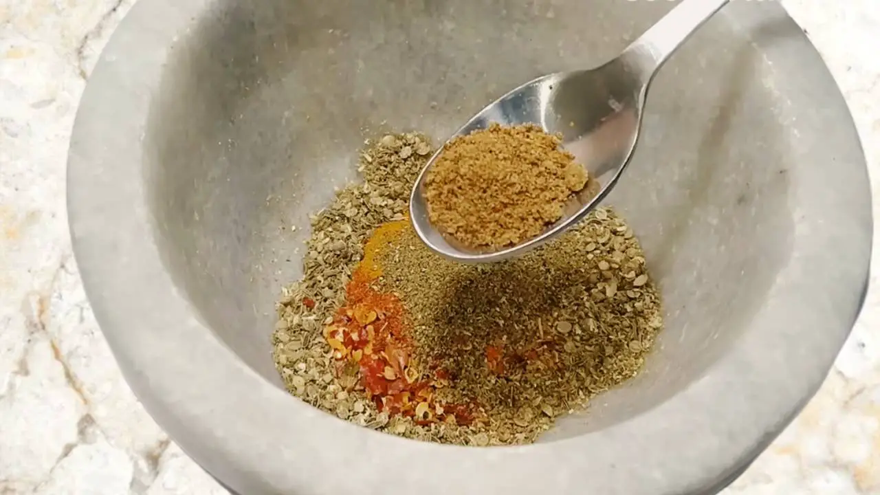 Adding ½ tsp of chaat masala powder