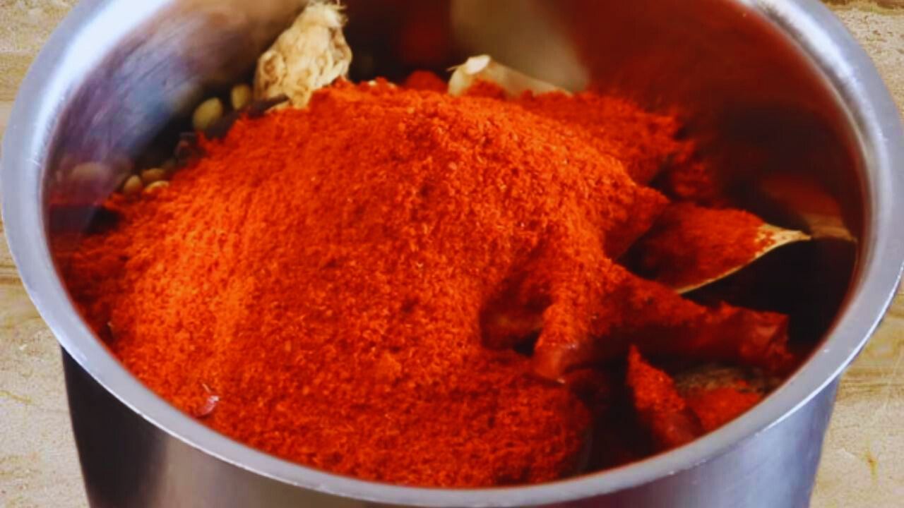 Adding 3 tbsp of Kashmiri red chili powder to it