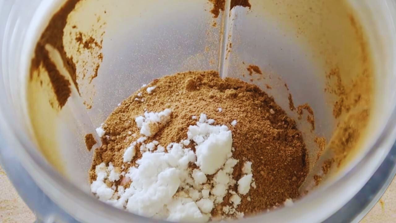 Adding ½ tbsp of table salt to the ingredients in the grinder