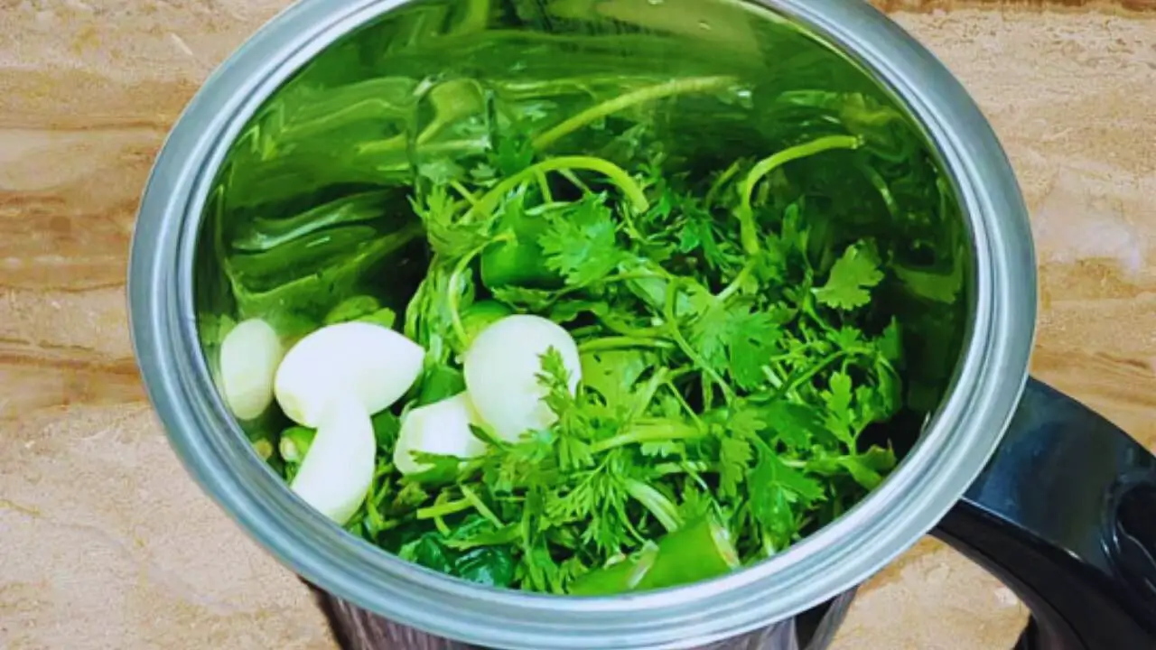 Added 4 large cloves of garlic to the ingredients in the grinder