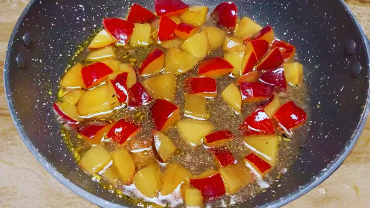 Added the diced and soaked plums into the pan with the water