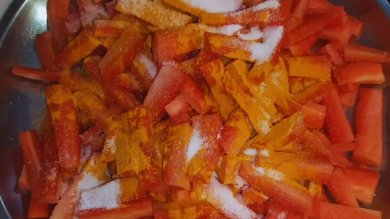 Added ½ tbsp turmeric powder and ½ tbsp salt into the carrots